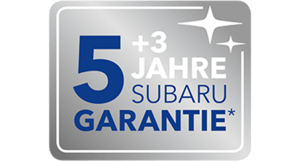 Subaru Signet mit Aufschrift '5 + 3 Jahre Subaru Garantie' auf silbernem Hintergrund